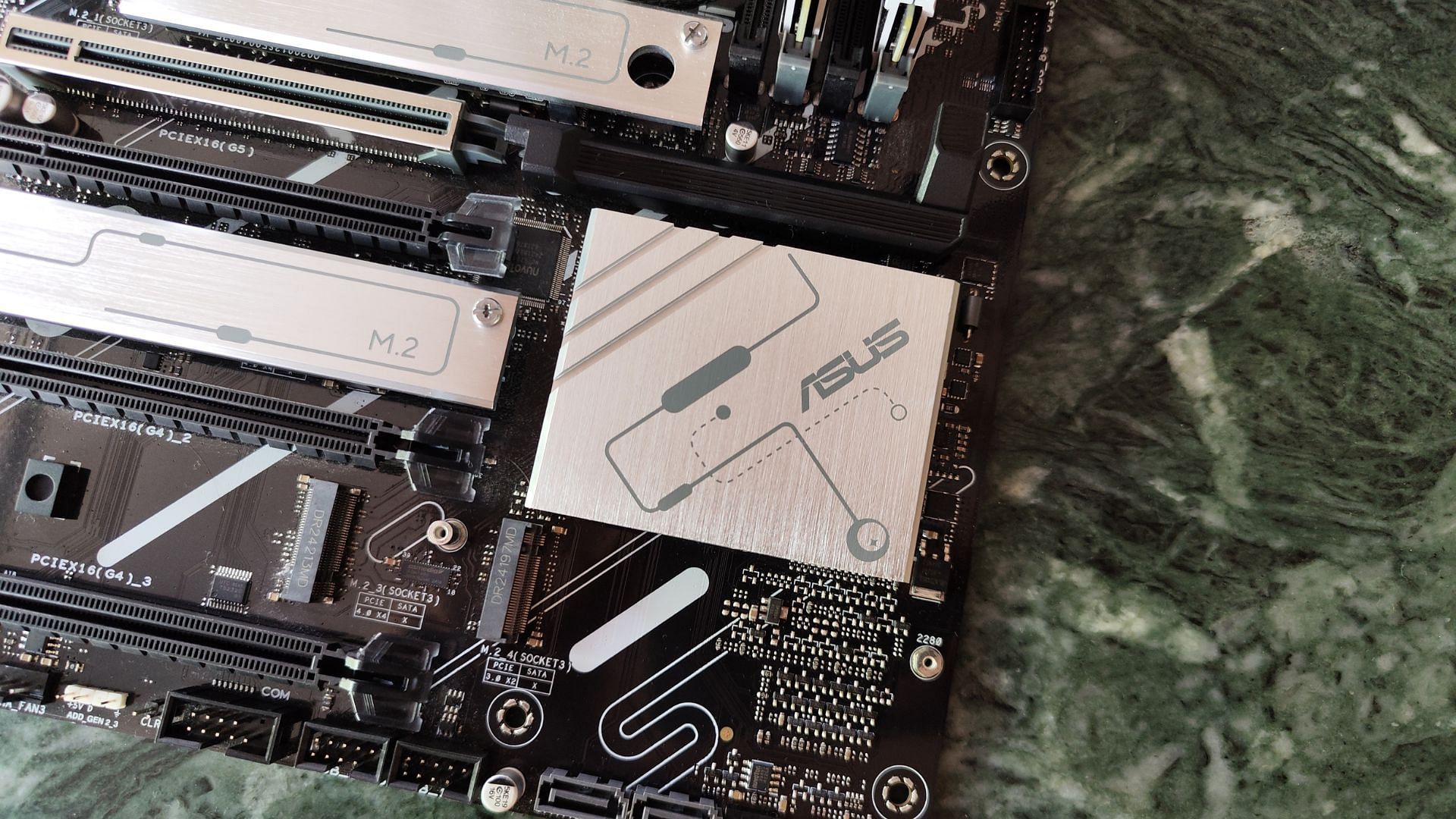 The Southbridge chipset heatsink is much smaller than most X870 boards (Image via Sportskeeda)
